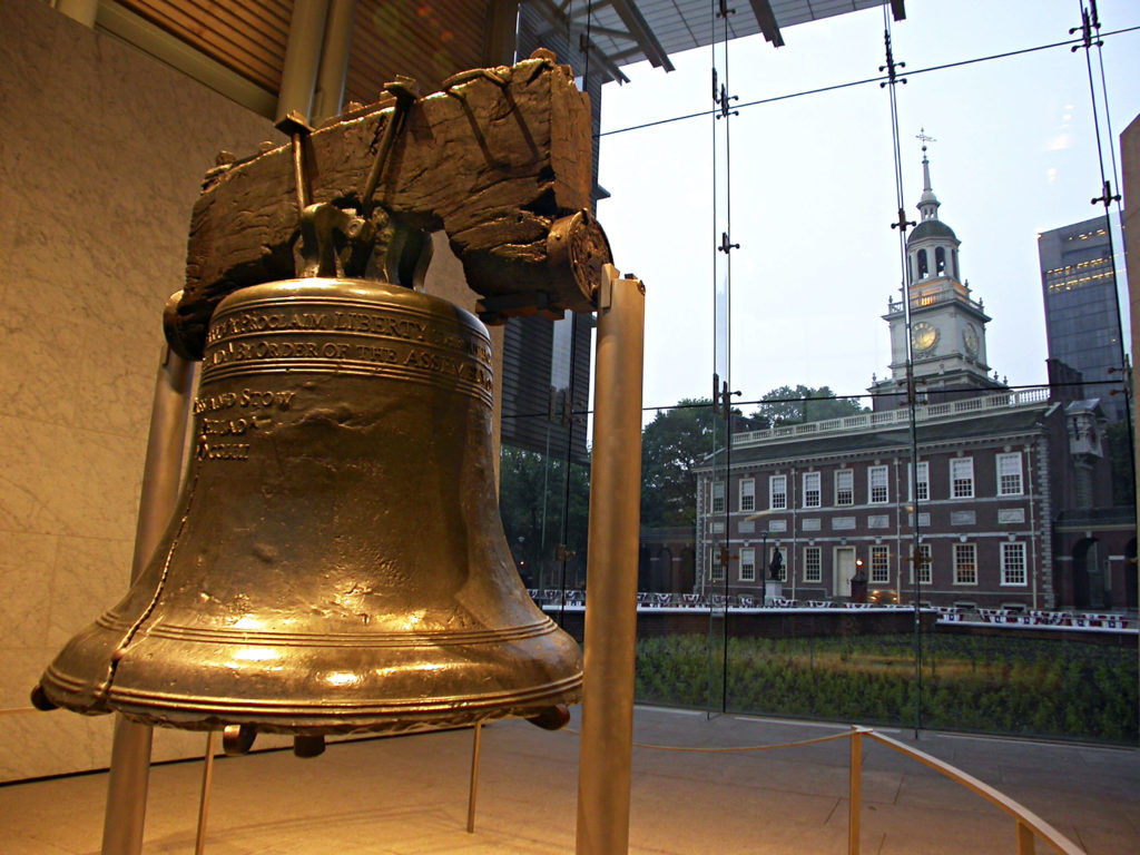 close up of the Liberty Bell and Independence Hall